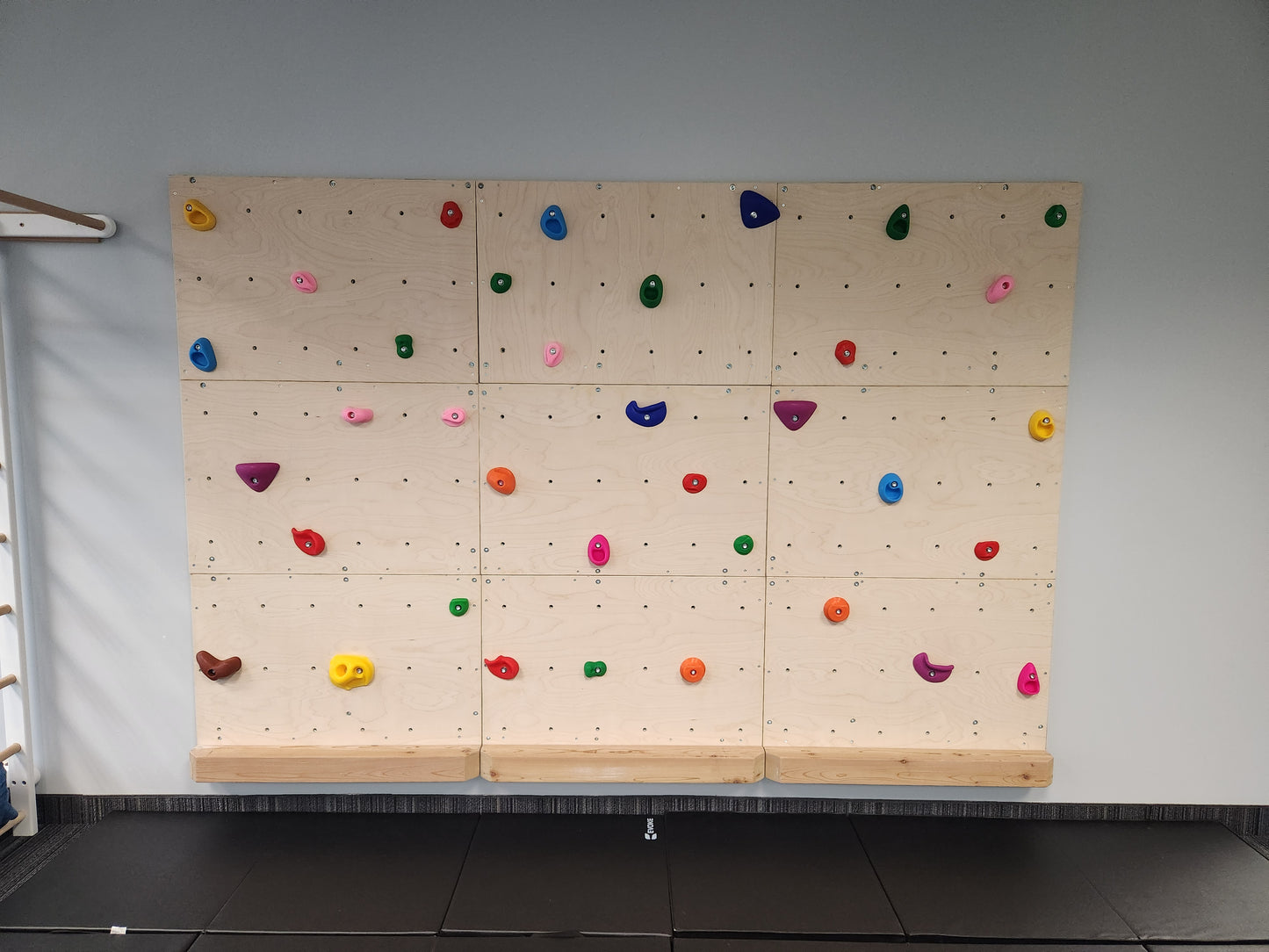9 Standard Sized Rock Climbing Wall Panels with optional support ledge for children with mobility issues.